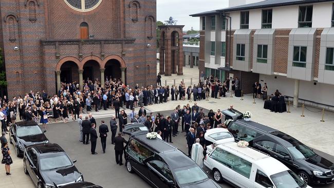 Family and friends gather to farewell Lars, Vivian and Annabelle Falkholt earlier this month. Picture: AAP