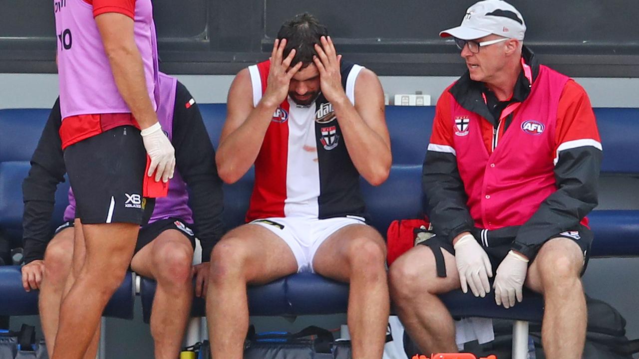 Paddy McCartin sits on the bench in distress at Ballarat last month.