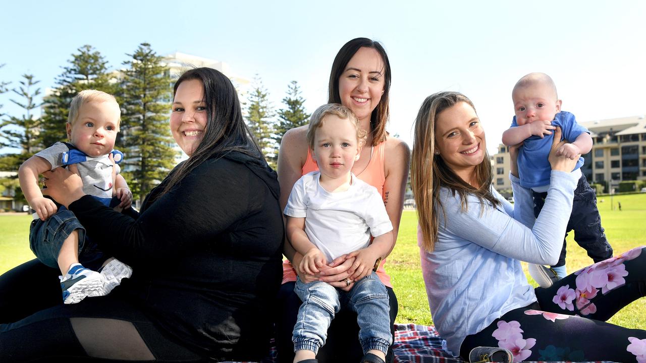 Emma Tarbeeke, 32, and baby Jackson, 18 months, with Amy Purling, 29, and baby James, 2, and Gen Toop, 32, and baby Loxton, nine months. Picture: Tricia Watkinson
