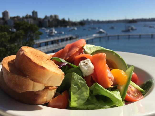 Salmon and avocado salad at Redleaf, complete with harbour backdrop. Picture: Jenifer Jagielski