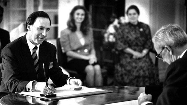 Power dressing: the new prime minister Paul Keating with governor-general Bill Hayden being sworn in at Government House. Picture: Anthony Weale