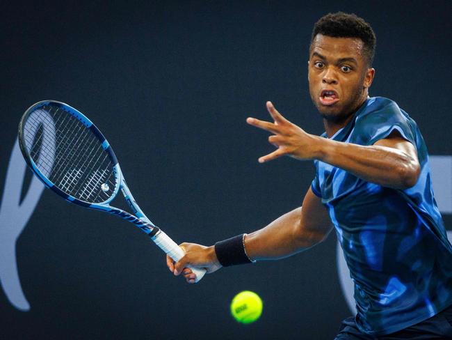 Giovanni Mpetshi Perricard hits a return against Nick Kyrgios. Picture: AFP