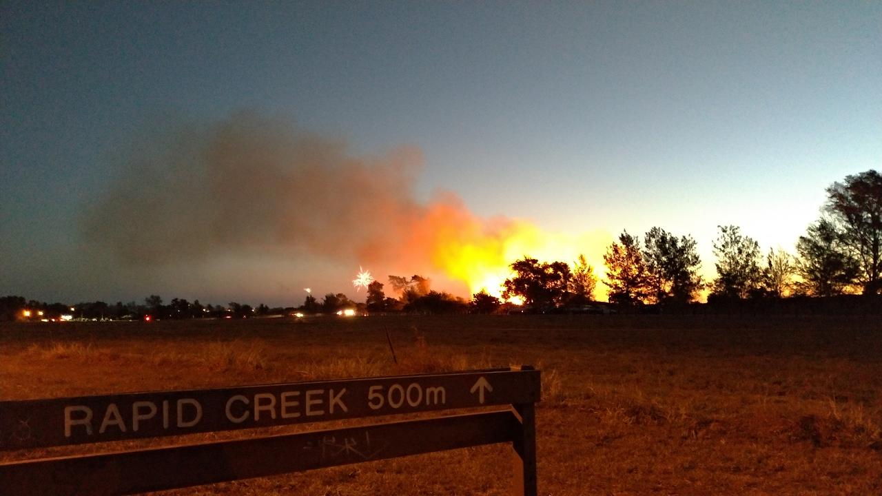 Fires in the northern suburbs on Territory Day. Picture: Ali Rajabipour