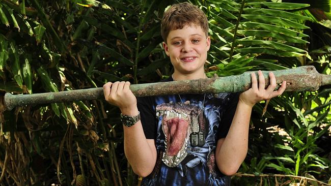 Christopher Doukas and the cannon he found.