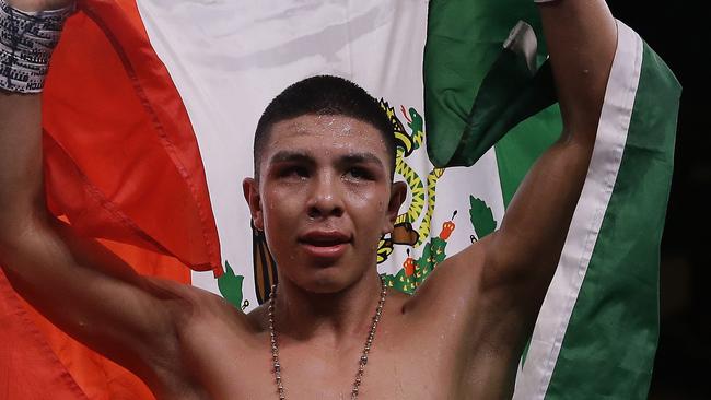 Jaime Munguia celebrates his victory over Takeshi Inoue for the WBO Junior Middleweight championship which he will defend against Dennis Hogan. Picture: Bob Levey/Getty Images/AFP 