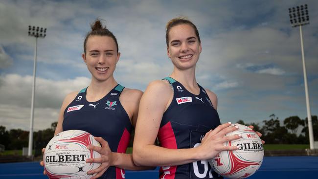 Vixens players Olivia Lewis (left) and Kiera Austin (right) at the Netball stadium in Parkville. Pictures: Tony Gough.