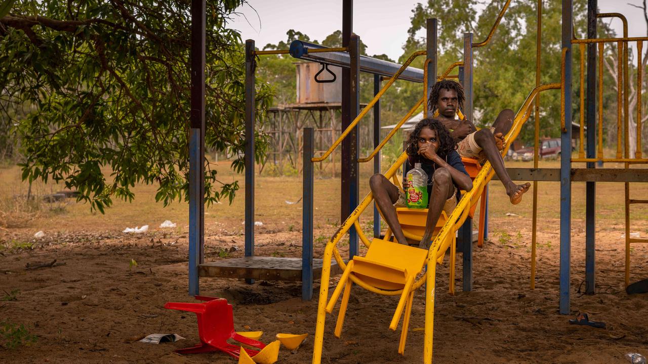 Rekayia and Quentin Rankin, also 14, play in the rundown school playground.