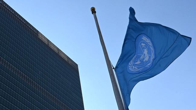 The flag of the United Nations is flown at half-mast in front of the Secretariat building March 11, 2019, the morning after an Ethiopian Airlines Boeing 737 passenger jet to Nairobi crashed early on March 10, 2019 with 149 passengers and eight crew members aboard with no survivors. - No other flags will be flown when the UN flag is at half-mast.Flags flew at half-staff at the United Nations on Monday after 21 UN staff were killed in an Ethiopian Airlines plane crash that Secretary-General Antonio Guterres said marked a "sad day" for the world body. (Photo by TIMOTHY A. CLARY / AFP)