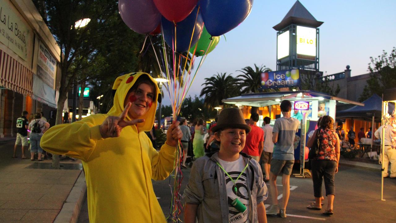 Clayton and Morgan Vellacott were happy to lend a hand at the Mardi Gras on Friday night. Photo: Erin Smith / Warwick Daily News