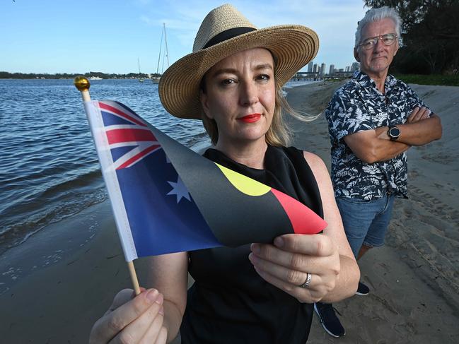 22/12/2025: Gold Coast Cr. Brooke Patterson holding the combination flag she has had changed with David Keys, who notified her of the flag, on the beach at South Port, Gold Coast. pic: Lyndon Mechielsen/The Australian