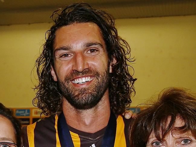 2014 AFL Grand Final match between Hawthorn Hawks and the Sydney Swans at the MCG Melbourne Cricket Ground on September 27,2014 Picture:Wayne Ludbey Enzo Spangher father of Matt Spangher & his mum and suster Story Mark Robinson