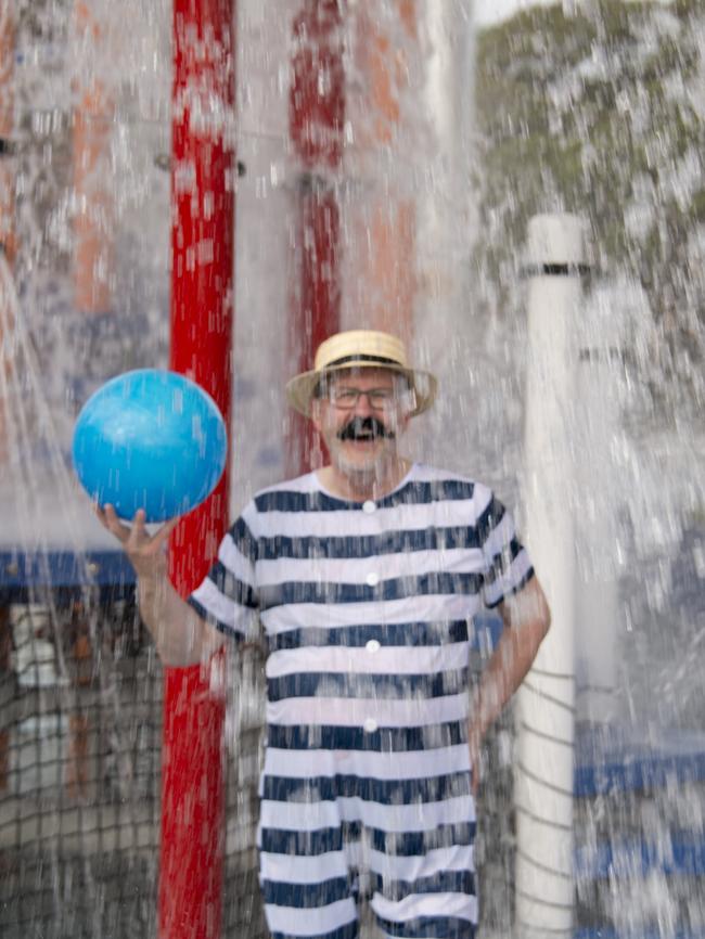 Moreland Mayor John Kavanagh gets into the spirit in the new kids’ splash pool.