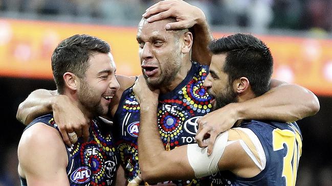 Cameron Ellis-Yolmen celebrates with Wayne Milera and Rory Atkins. Picture SARAH REED