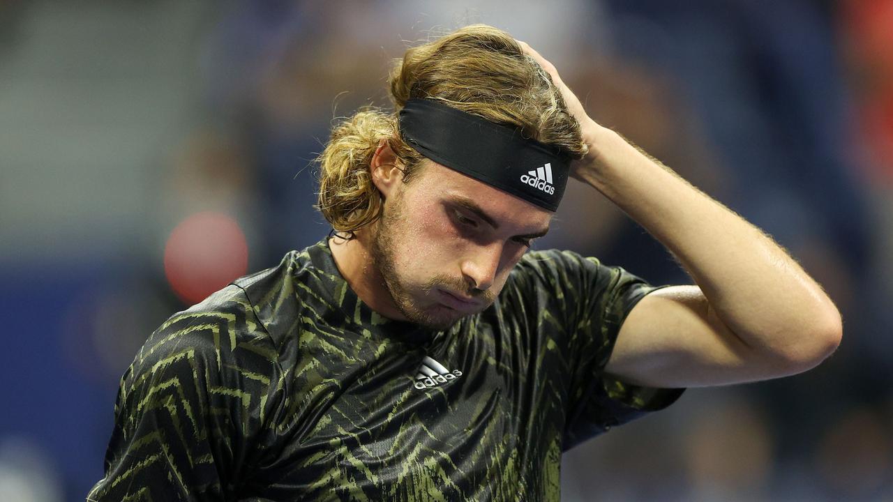 NEW YORK, NEW YORK - AUGUST 30: Stefanos Tsitsipas of Greece reacts against Andy Murray of United Kingdom during their men's singles first round match on Day One of the 2021 US Open at the Billie Jean King National Tennis Center on August 30, 2021 in the Flushing neighborhood of the Queens borough of New York City. Elsa/Getty Images/AFP == FOR NEWSPAPERS, INTERNET, TELCOS &amp; TELEVISION USE ONLY ==