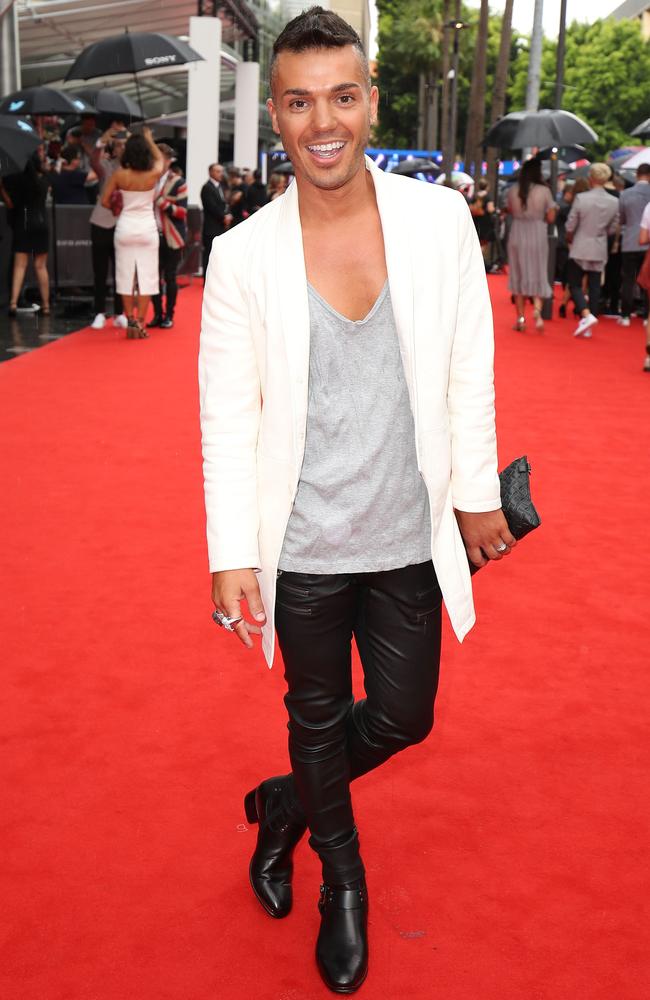 Anthony Callea kicks up his heels on the red carpet.