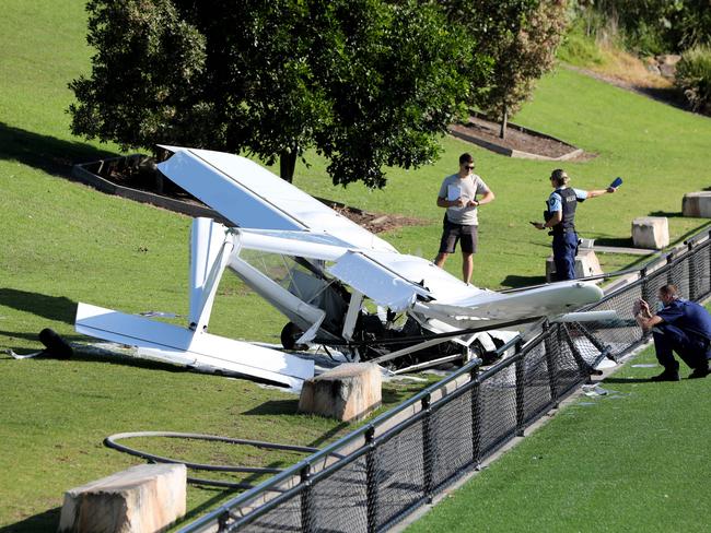 Police take images of the crash. Picture: Damian Shaw