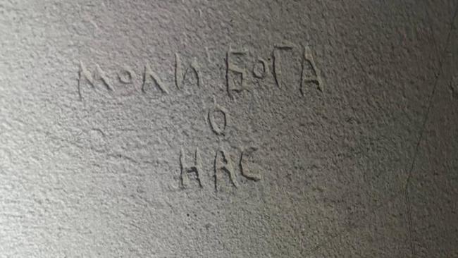 The writing on the wall in Russian reads: “Pray god for us. God, give strength. God, save and protect.” Picture: Supplied