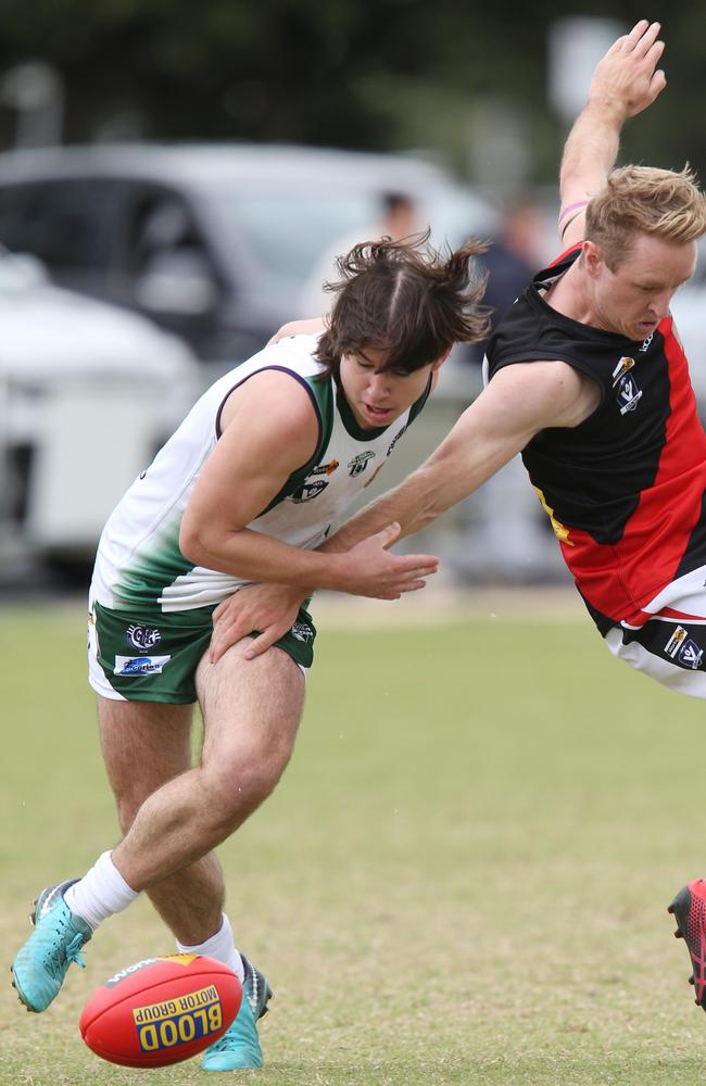 Bell Park’s Fraser Marris and Newtown &amp; Chilwell’s Mitch Diamond battle for the ground ball. Picture: Mark Wilson