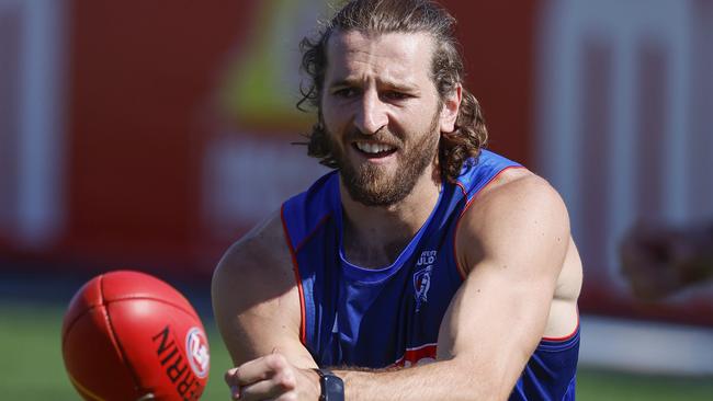 NCA. MELBOURNE, AUSTRALIA. 5th March, 2025 . Western Bulldogs training at Whitten Oval .   Bulldog Marcus Bontempelli takes it easy after injuring his calf during the practise match against Hawthorn   .  Picture: Michael Klein