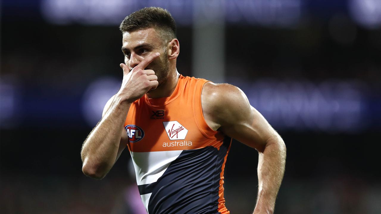 Stephen Coniglio celebrates a goal with his signature move earlier this year.