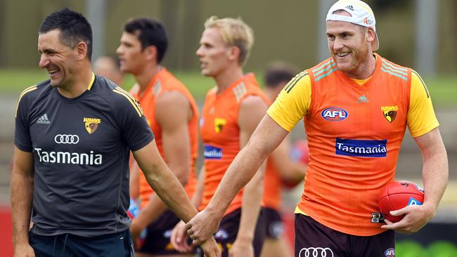 Hawks assistant coach Adam Yze with Jarryd Roughead at training. Picture: Tom Huntley