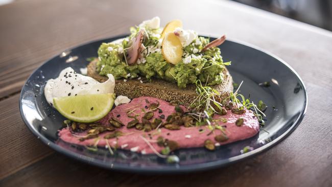 Smashed avocado on rye, served with feta, lime, beetroot, spiced pepitas and herbs.