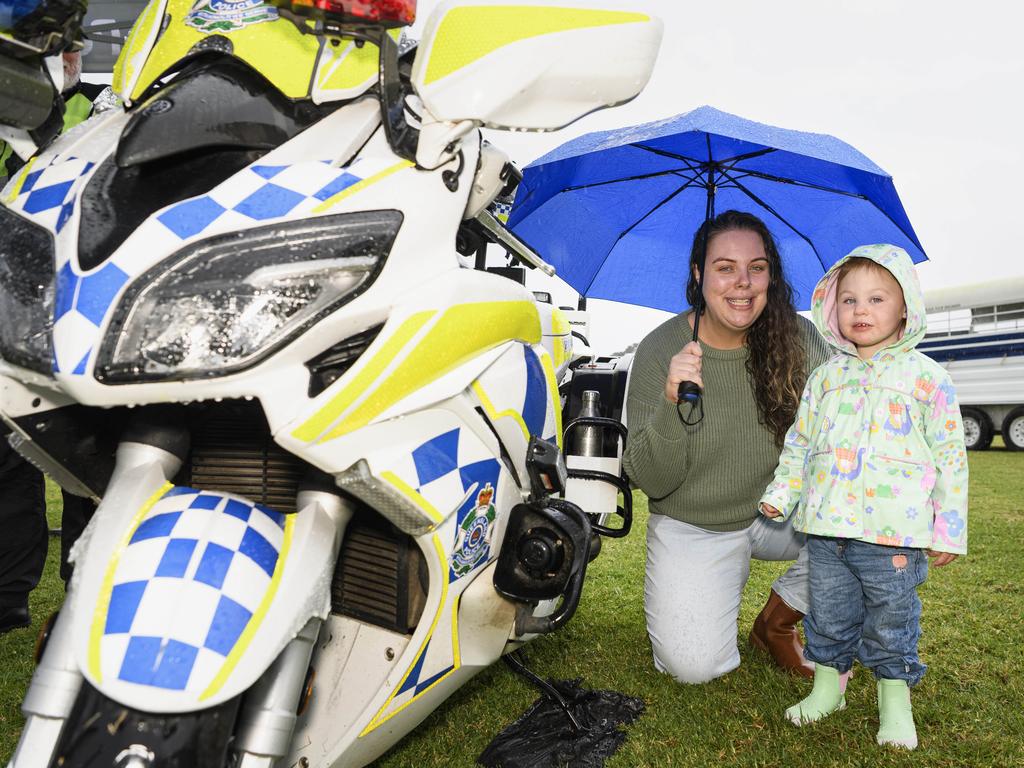 Emily Balch with her daughter Isla Blackwell at the Queensland Police Community Safety and Career Expo on the TAFE oval, Saturday, May 31, 2025. Picture: Kevin Farmer
