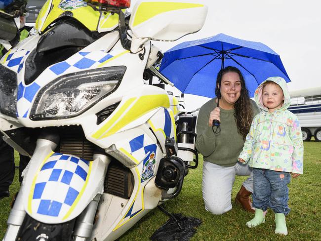 Emily Balch with her daughter Isla Blackwell at the Queensland Police Community Safety and Career Expo on the TAFE oval, Saturday, May 31, 2025. Picture: Kevin Farmer