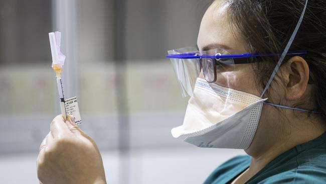 A staff member prepares Pfizer vaccine doses. Picture: Getty Images