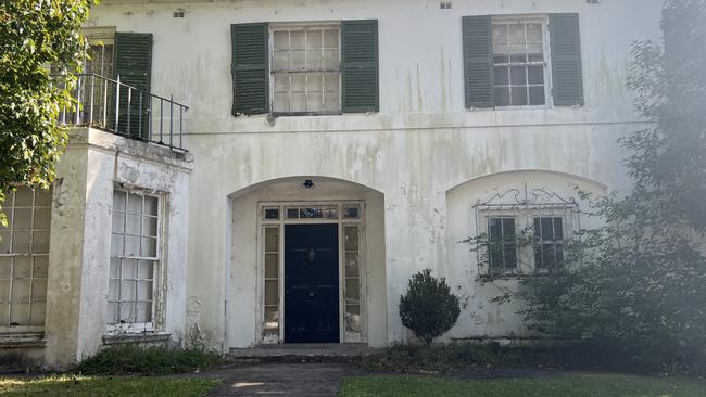 The derelict mansion in Edgecliff.