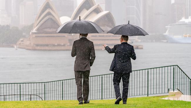 Prime Minister Anthony Albanese points out the Sydney sights to former US president Barack Obama on Monday.