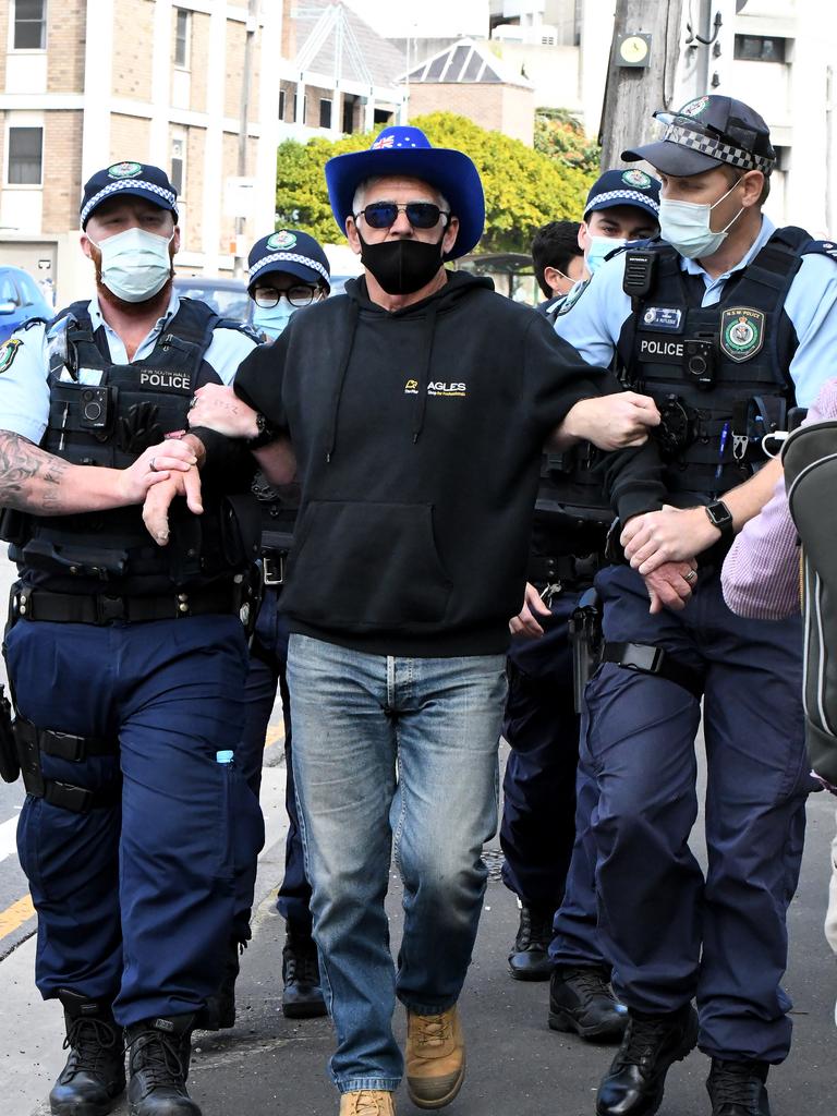 A man who was led away by police in Sydney. Picture: Matrix