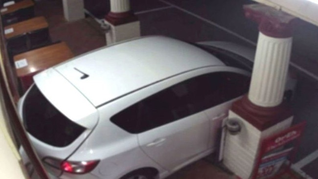 The alleged stolen Mazda reversed up to the pub on Saturday morning. Picture: SA Police