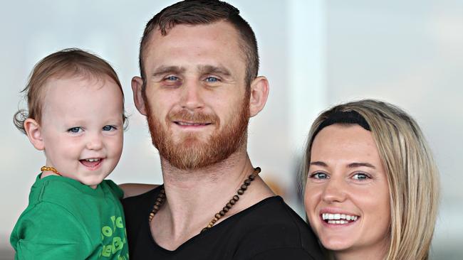 Dennis Hogan with daughter Aria and partner Brideen. Picture: Annette Dew