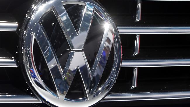 FILE - In this Sept. 22, 2015, file photo, the logo of Volkswagen is displayed on a car during the Car Show in Frankfurt, Germany. German prosecutors say they have widened their investigation of Volkswagen to include suspicion of tax evasion after revelations that some of its cars were emitting more carbon dioxide than officially reported. Braunschweig prosecutor Birgit Seel told The Associated Press on Tuesday Nov. 24, 2015 that the investigation was focused on five Volkswagen employees but would not release their names. (AP Photo/Michael Probst, File)