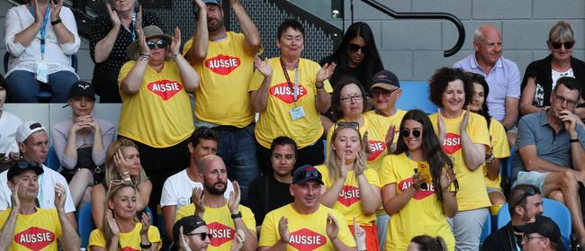 Australia fans dressed in Vegemite T-shirts as part of the Barty Army.                        (AAP Image/David Crosling) 