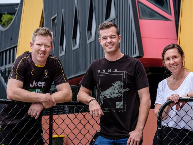 Richmond's Jack Riewoldt with V8 driver Scott McLaughlin and Emma Murray. Picture: Jaime Murcia