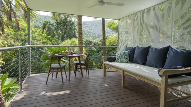 Bush surrounds the veranda of one of the pavilions at Mist at Cape Tribulation.