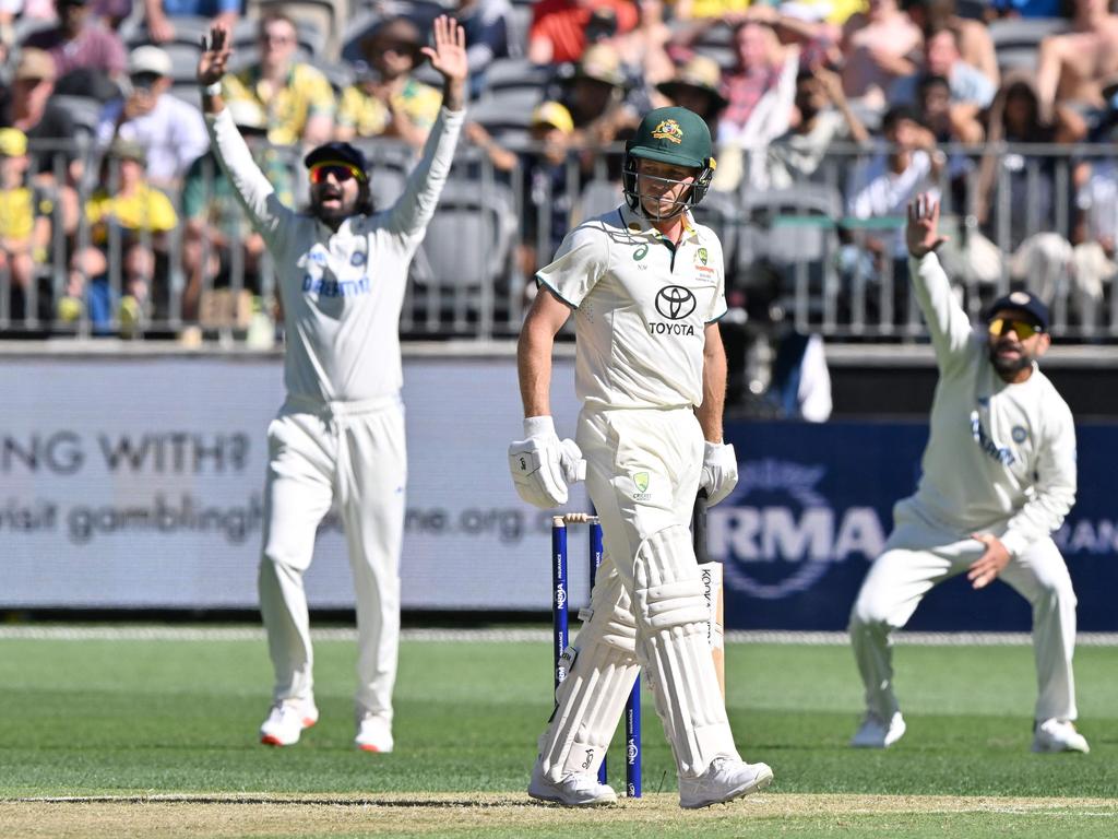 Debutant Nathan McSweeney was the first Aussie wicket to fall, trapped LBW by Jasprit Bumrah. (Photo by SAEED KHAN/AFP)