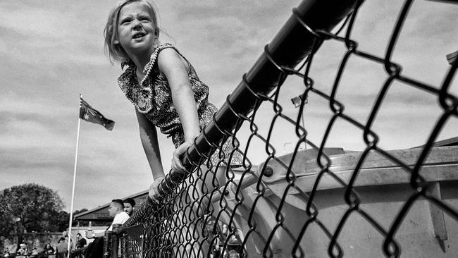 A young fan takes in the action.