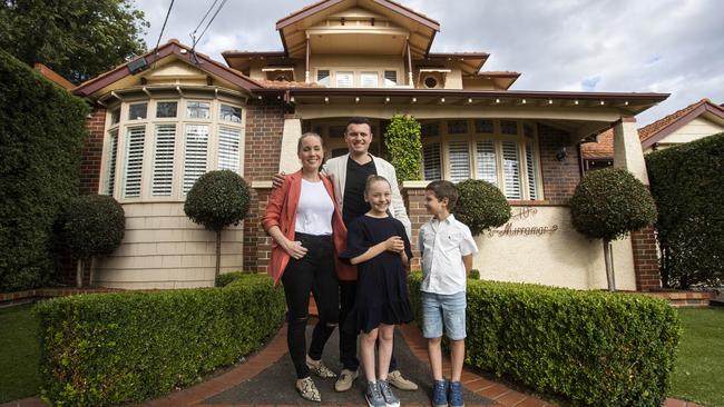 Shaun and Linda Borg, with their children Ava and Connor, outside their home in Essendon which they are selling. Picture: Aaron Francis