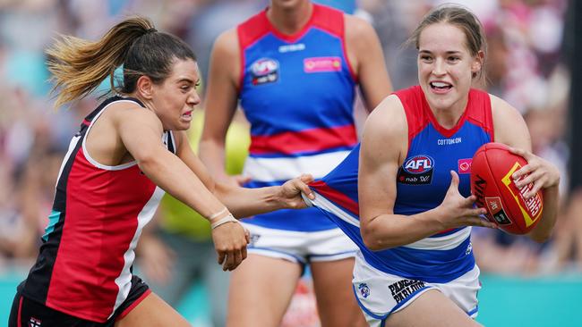 Western Bulldogs footballer Isabel Huntington evades her St Kilda opponent during the 2020 season. Picture: AAP IMAGE/MICHAEL DODGE