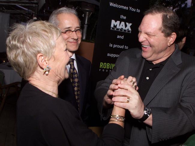 Dame Judi Dench with Harvey Weinstein in 2002. Picture: Kevin Winter/Getty Images