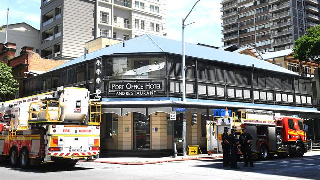 Firefighter battling the blaze at Brisbane's Port Office Hotel. Wednesday January 23, 2019. Picture: AAP/John Gass