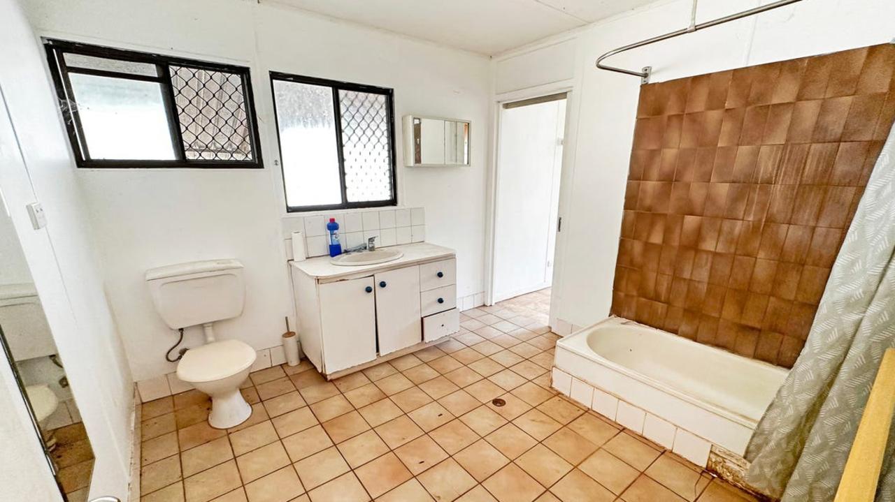 The bathroom may not be luxurious but it is spacious. Picture: realestate.com.au