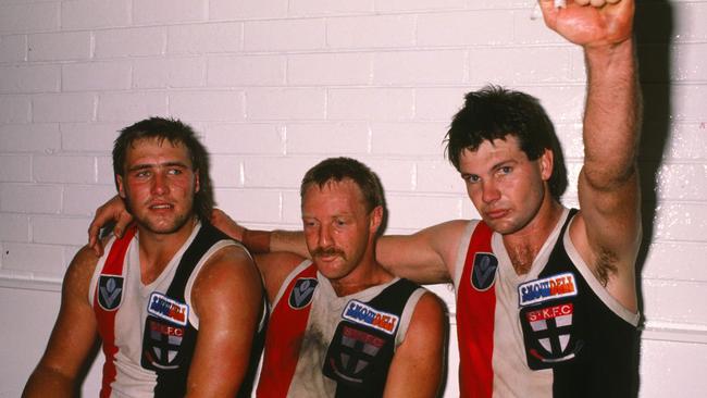 Danny Frawley, Geoff Cunningham and Tony Lockett in the St Kilda rooms after a match in 1989.