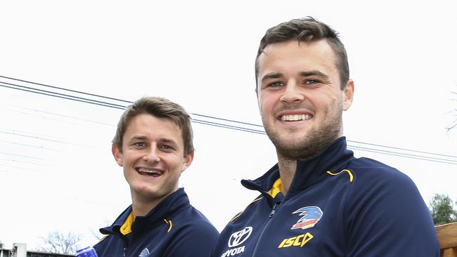 Brothers Matt and Brad Crouch during the Grand Final parade. Both are locked in at the Crows for the next three seasons. Picture: Sarah Reed