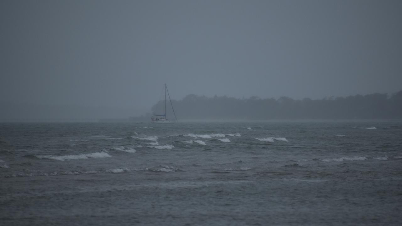 Wet weather over the sea at Hervey Bay. Photo: Stuart Fast