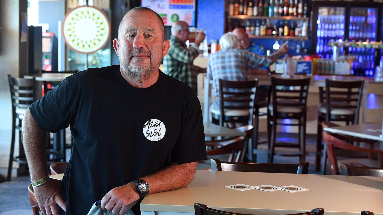 Ashley Robinson from the Alex Surf Club with patrons in the background.