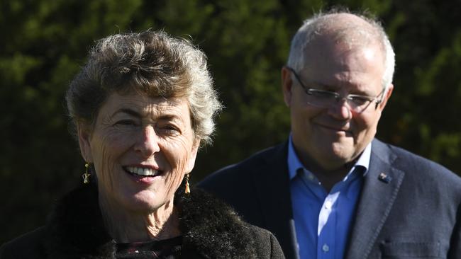 Liberal candidate for the seat of Eden-Monaro Fiona Kotvojs speaks to the media as Prime Minister Scott Morrison watches on on Sunday. Picture: AAP